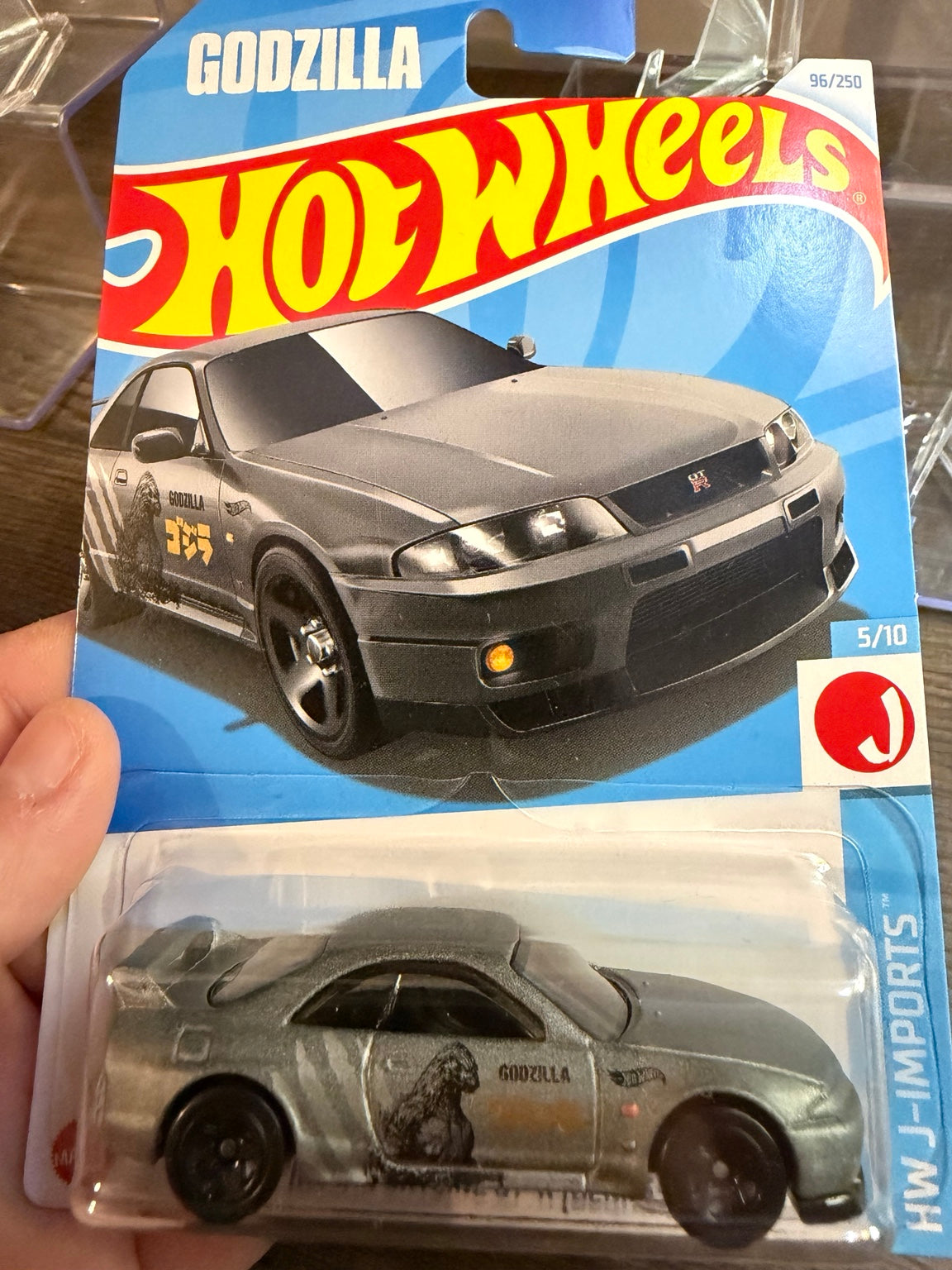 Hot Wheels Godzilla Nissan Skyline GT-R BCNR33, J-Imports card and car